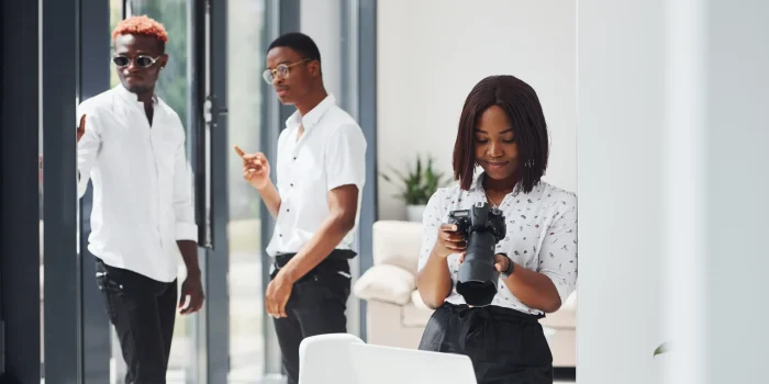 woman-testing-camera-group-african-american-business-people-working-office-together
